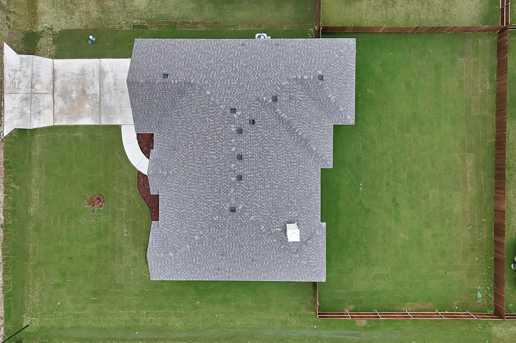 106 Panther Loop Mabank, TX 75147 - Photo 3 of 34 an aerial view of a house with a yard