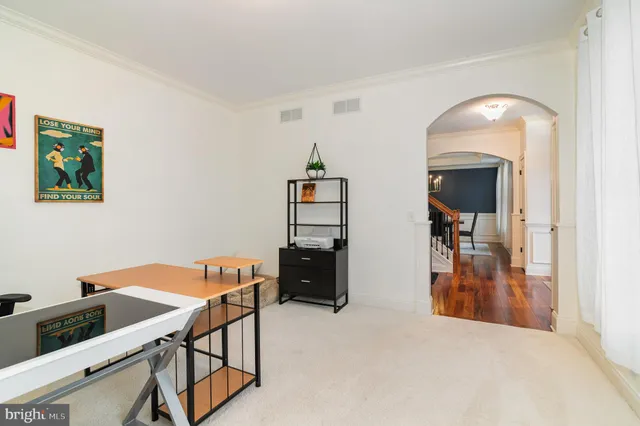 a workspace with furniture and window