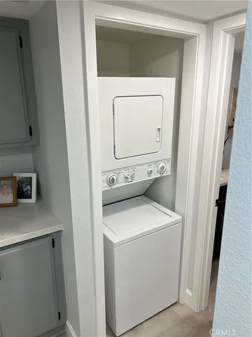 a bathroom with a sink vanity and a mirror