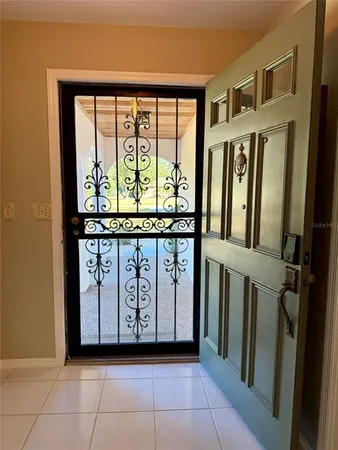 a view of a entryway with an empty room