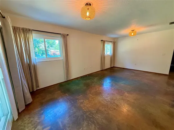 an empty room with windows