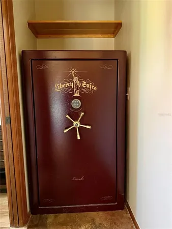 a bathroom with a double vanity sink toilet and a mirror