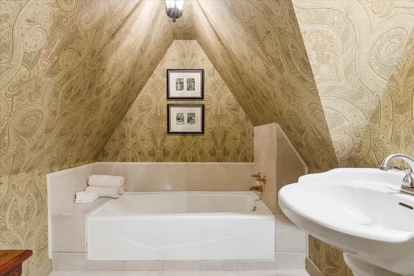 a bathroom with a sink and a bathtub