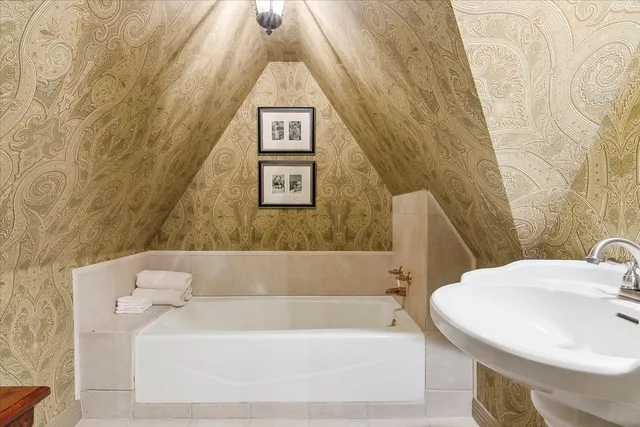 a bathroom with a sink and a bathtub