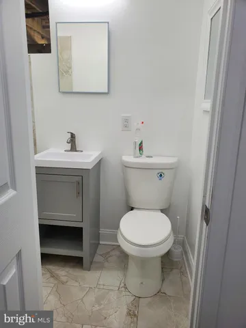 a kitchen with stainless steel appliances granite countertop a sink and a stove