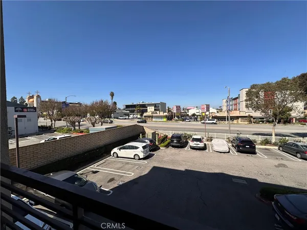 a view of a balcony with chairs
