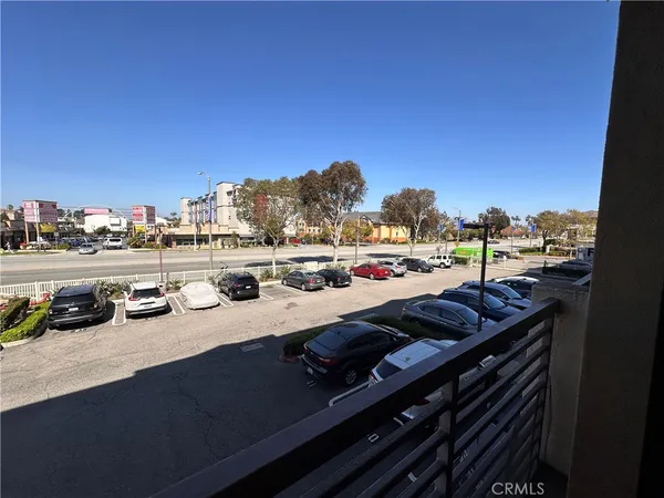 a view of a balcony with city view