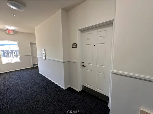 a view of parking with cars parked