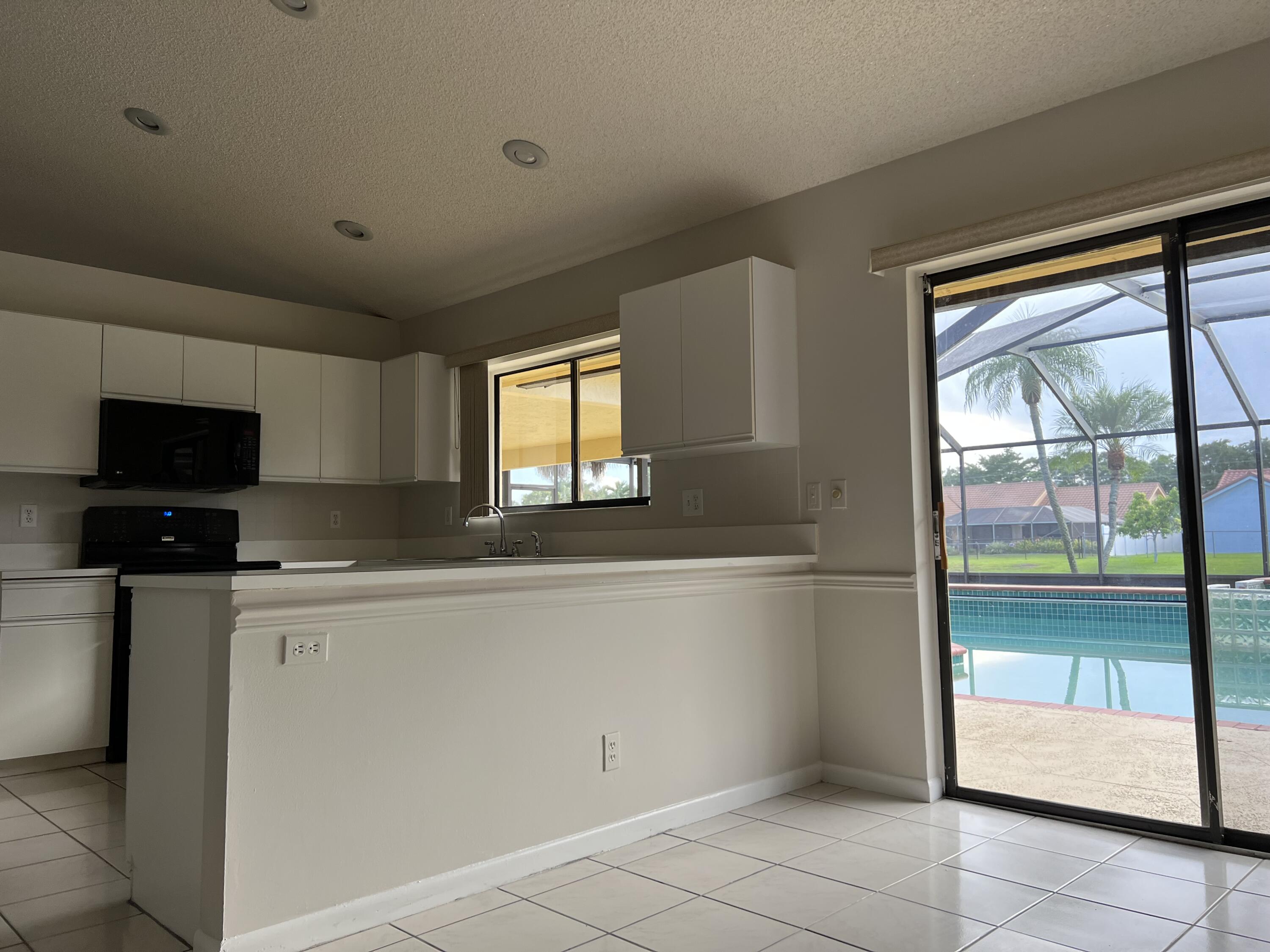 9775 Sun Pointe Drive Boynton Beach, FL 33437 - Photo 17 of 22 IMG-3498