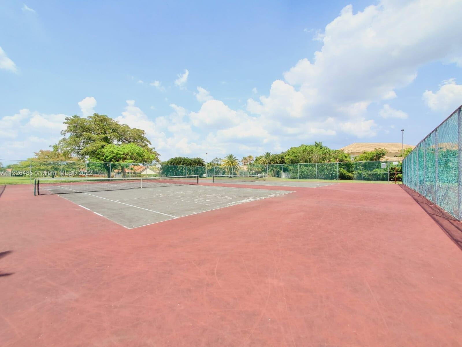 9775 Sun Pointe Drive Boynton Beach, FL 33437 - Photo 21 of 22 Tennis courts