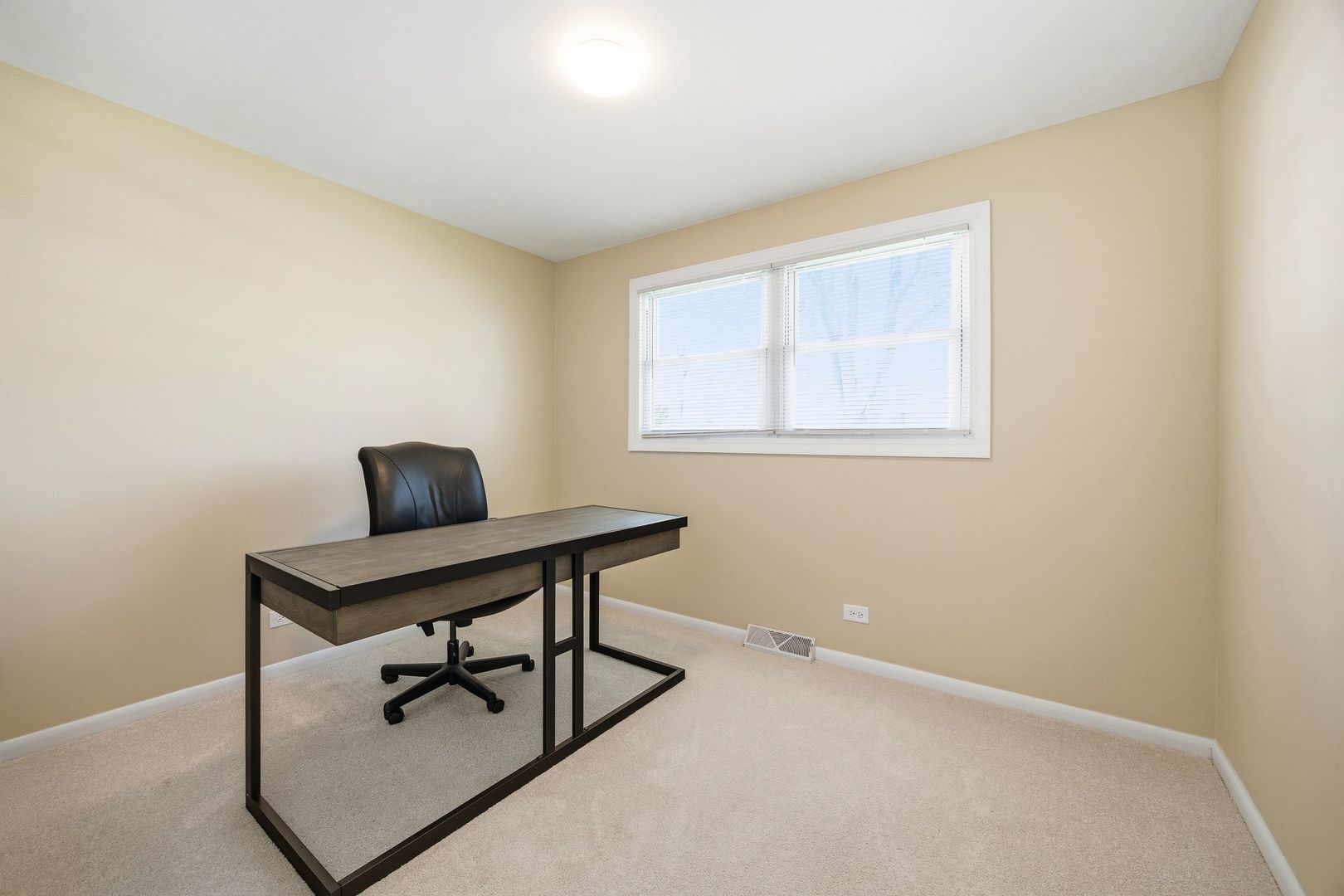 2117 Grouse Lane Rolling Meadows, IL 60008 - Photo 17 of 25 a view of a workspace with a window