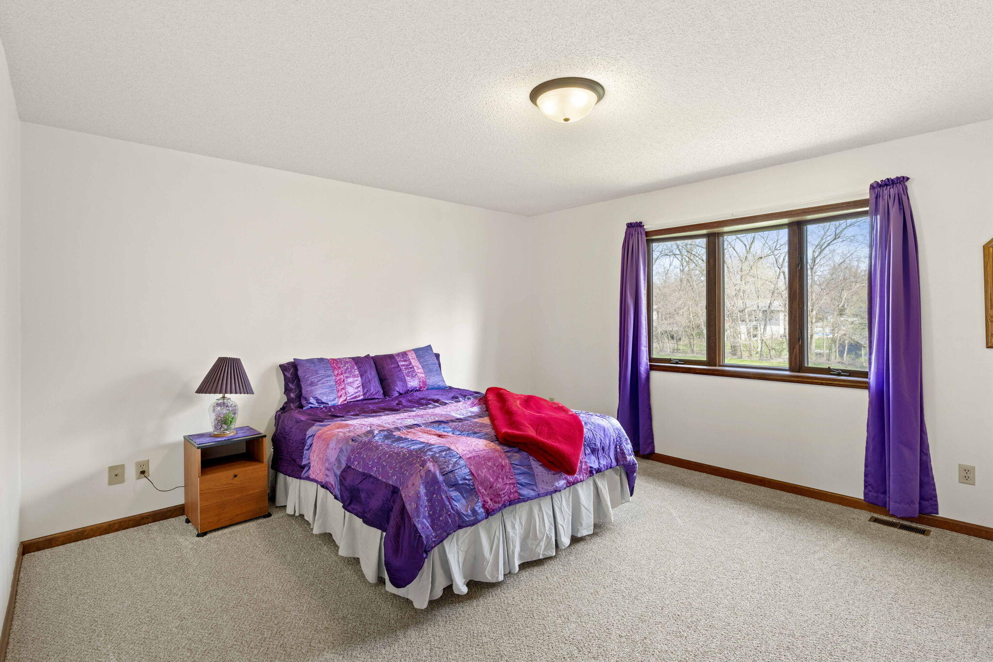 654 Harvest Court Crown Point, IN 46307 - Photo 15 of 43 a bedroom with a bed and window