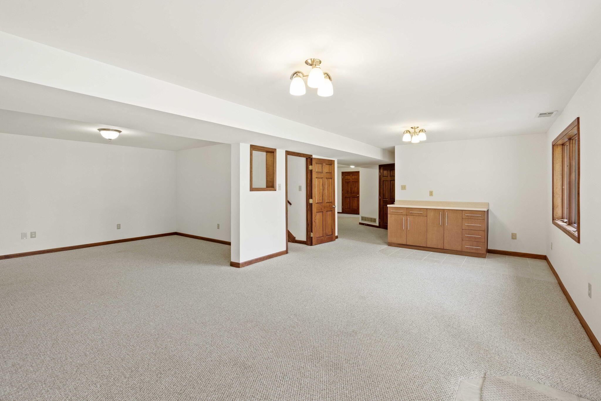 654 Harvest Court Crown Point, IN 46307 - Photo 22 of 43 a view of an empty room with a window