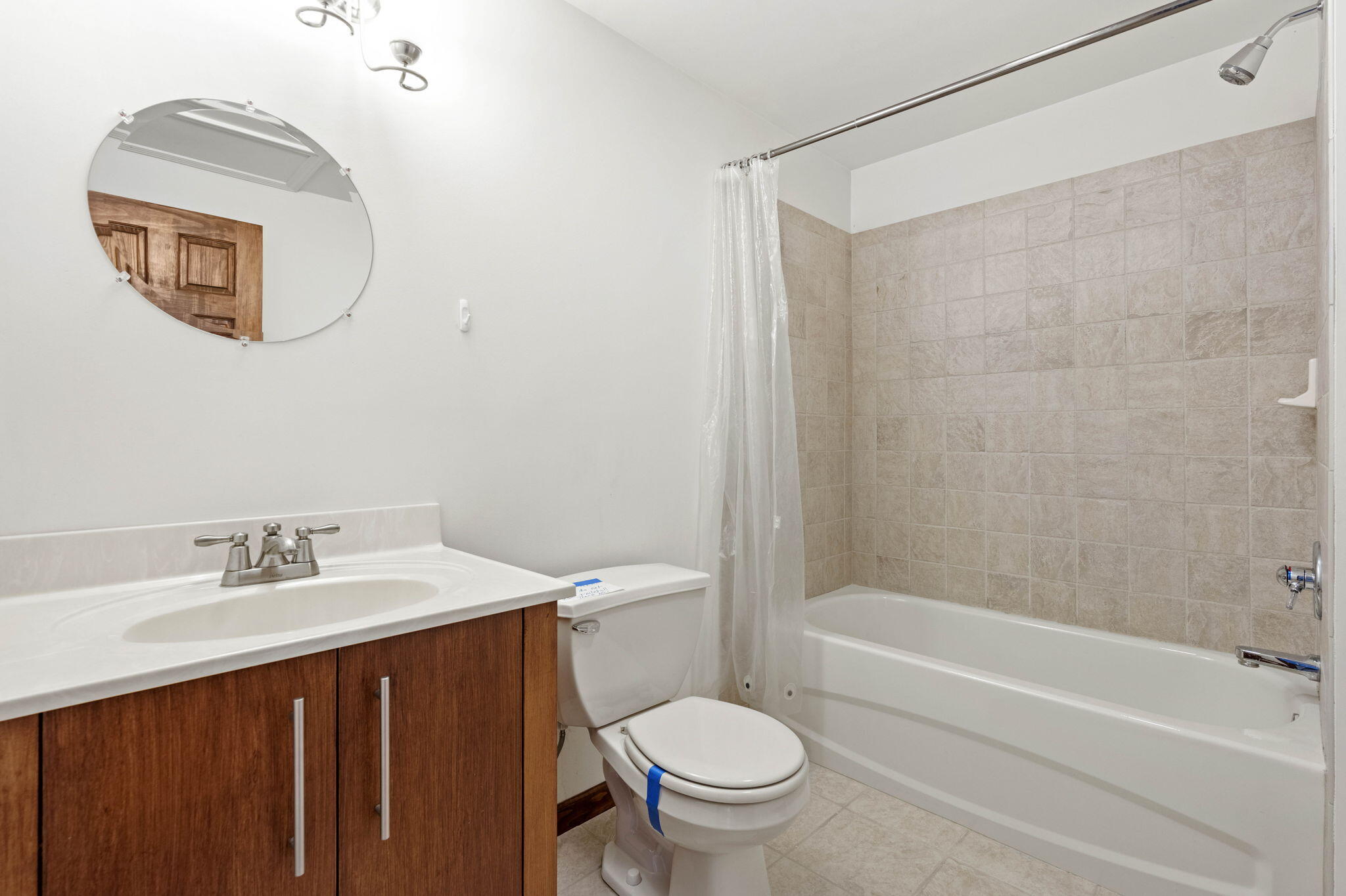654 Harvest Court Crown Point, IN 46307 - Photo 25 of 43 a bathroom with a sink a toilet and a mirror