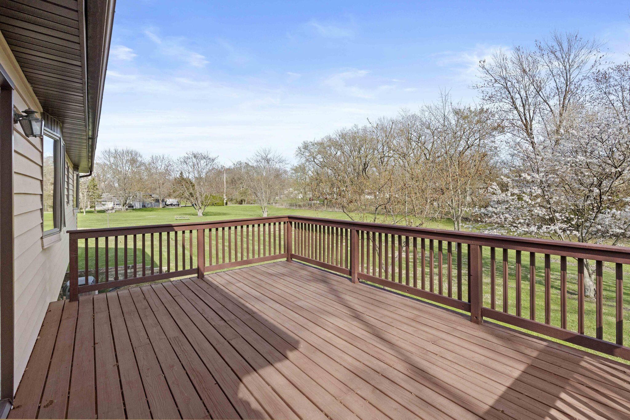 654 Harvest Court Crown Point, IN 46307 - Photo 31 of 43 a view of balcony with wooden floor