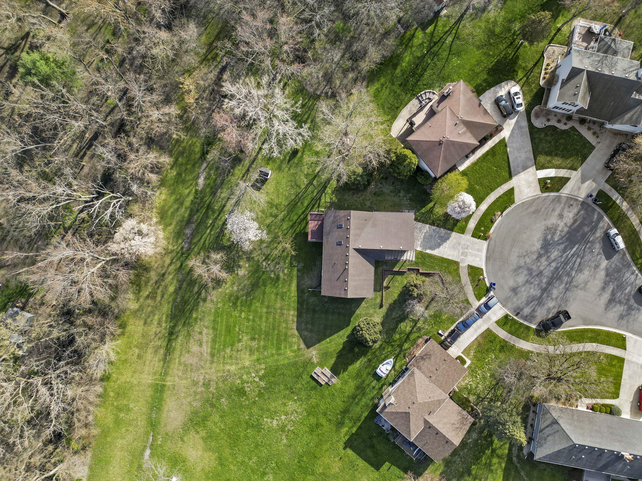 654 Harvest Court Crown Point, IN 46307 - Photo 42 of 43 an aerial view of a house with outdoor space and trees