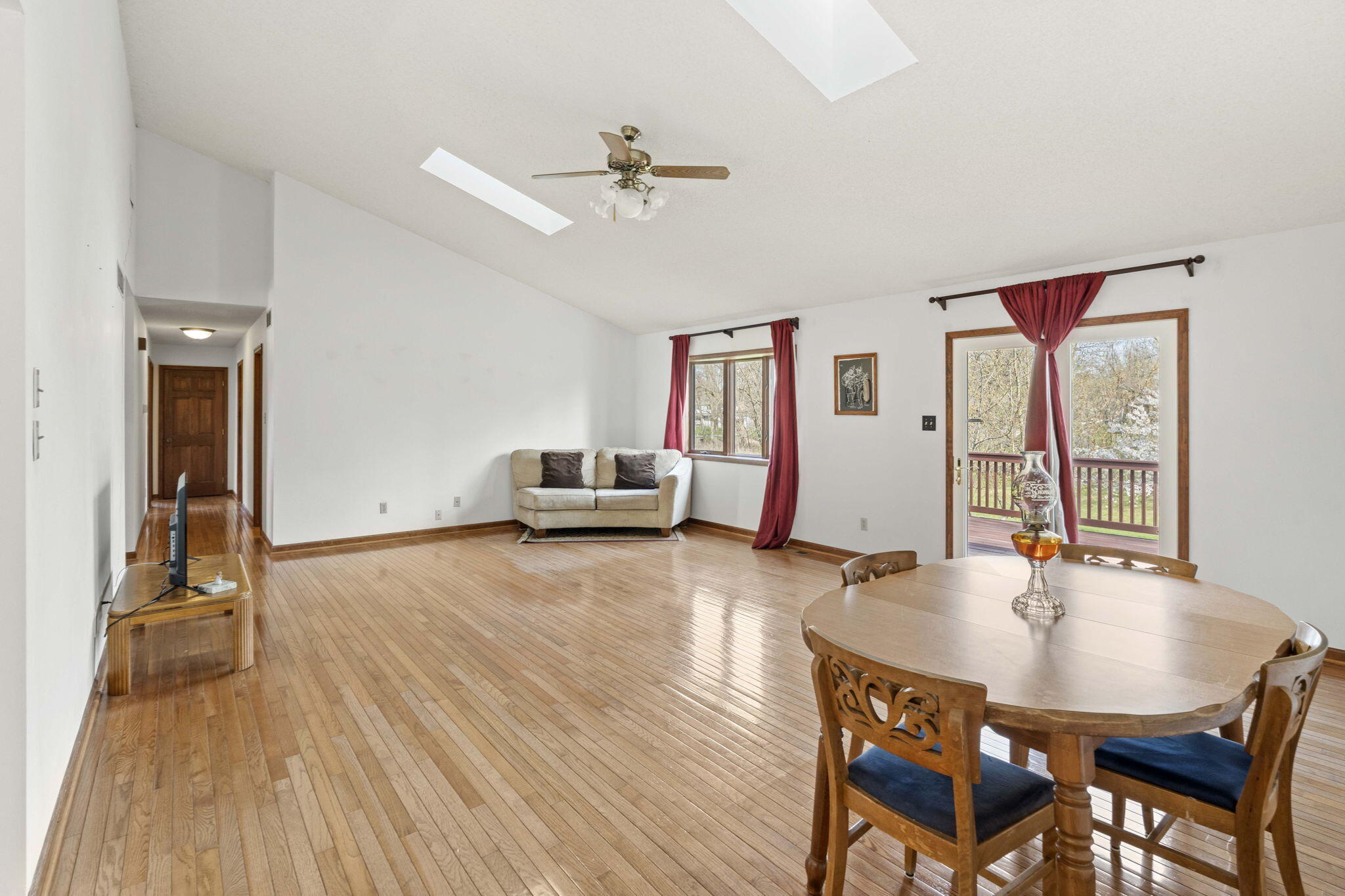 654 Harvest Court Crown Point, IN 46307 - Photo 7 of 43 a living room with furniture and a wooden floor