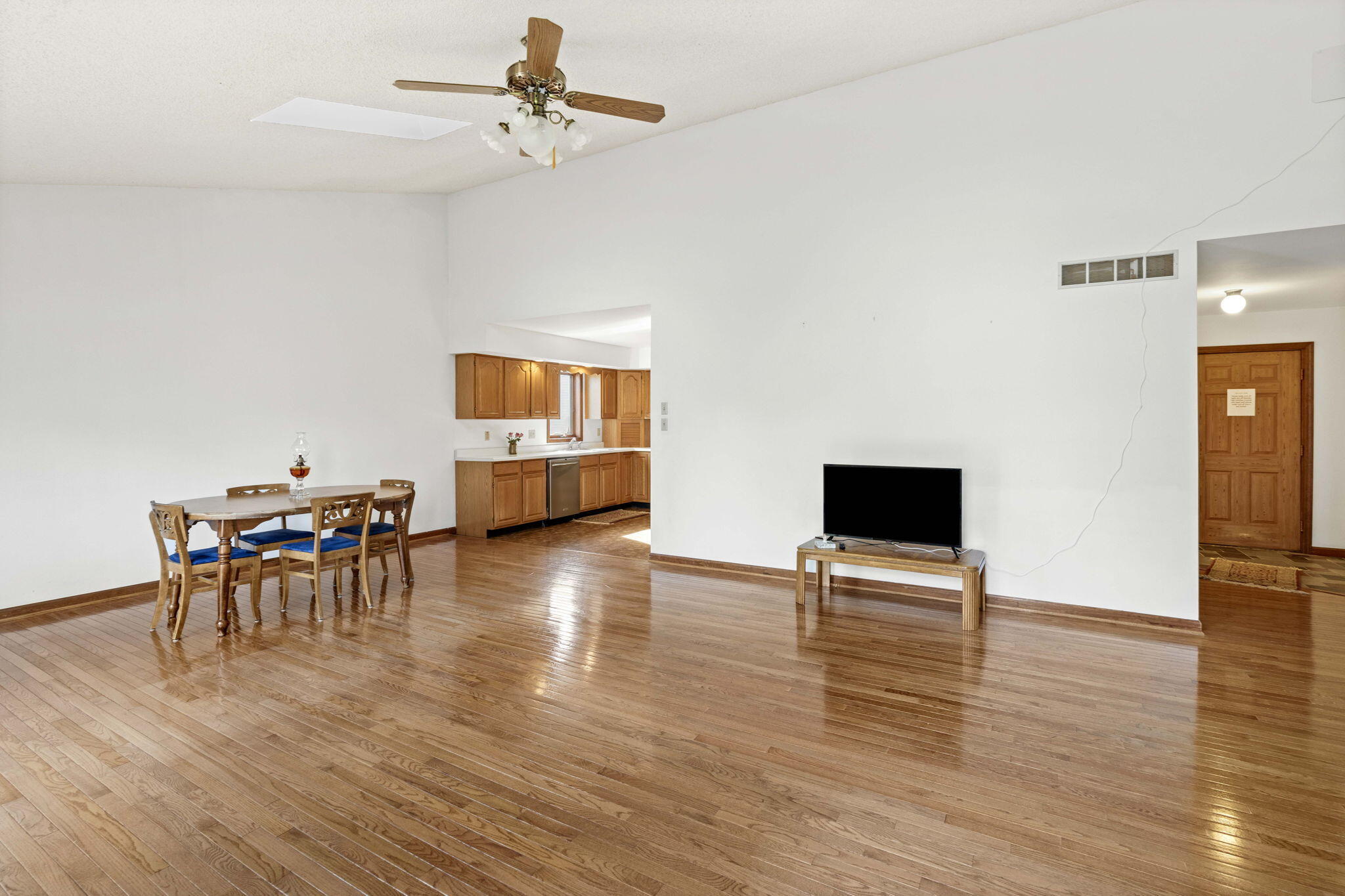 654 Harvest Court Crown Point, IN 46307 - Photo 9 of 43 a view of a livingroom with furniture and a flat screen tv