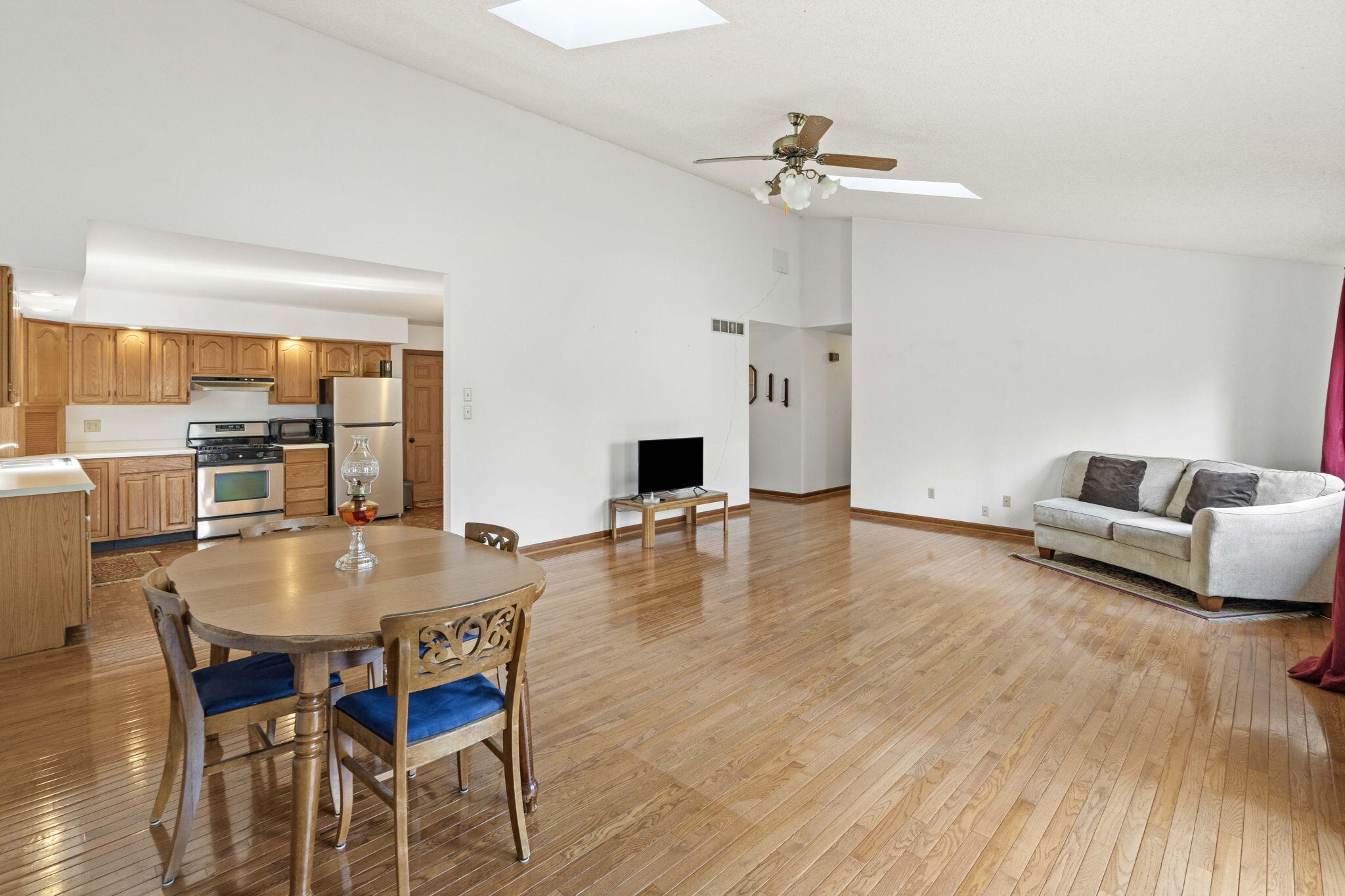 654 Harvest Court Crown Point, IN 46307 - Photo 10 of 43 a living room with furniture and a wooden floor