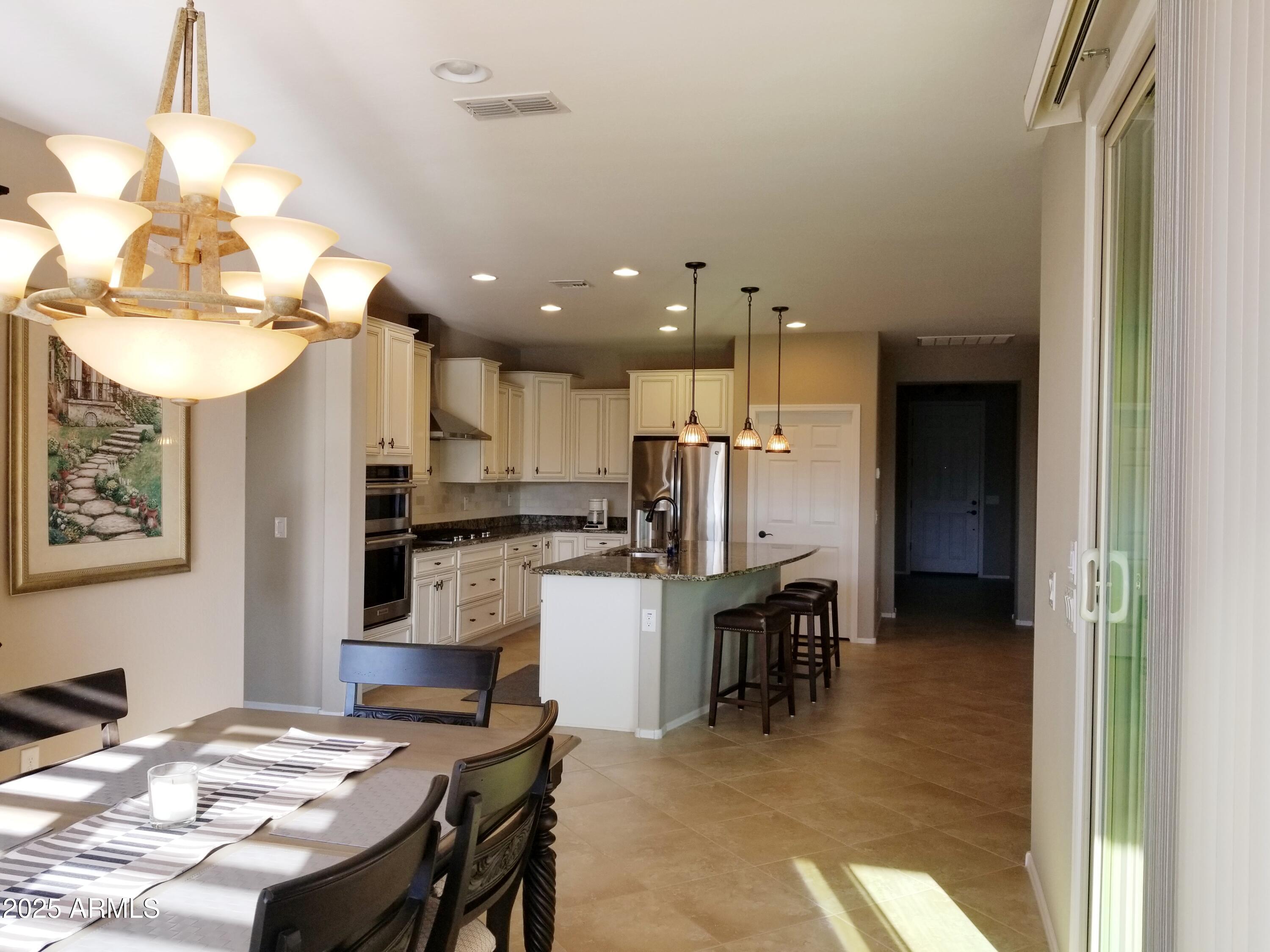 26881 West Utopia Road Buckeye, AZ 85396 - Photo 9 of 31 Utopia kitchen ad dining area