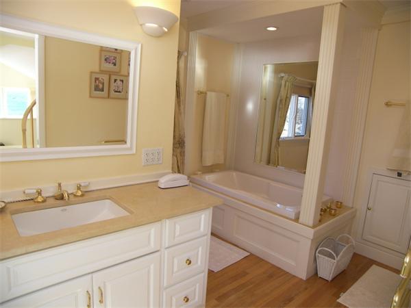 19 Summit Road Marblehead, MA 01945 - Photo 11 of 23 a bathroom with a tub sink and mirror
