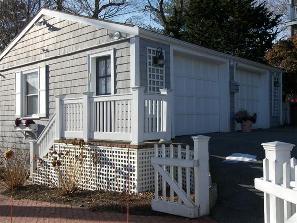 19 Summit Road Marblehead, MA 01945 - Photo 17 of 23 a front view of a house with a fence