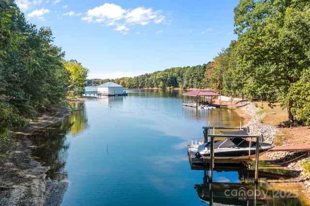a view of a lake with sitting area