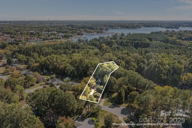 an aerial view of a golf course with parking space