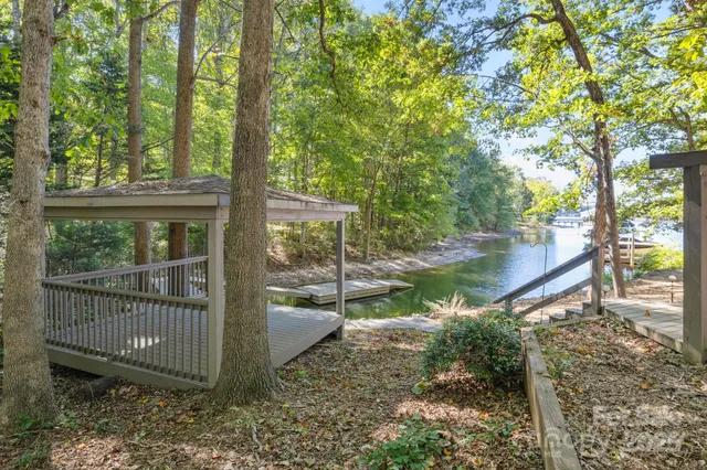 a view of a garden with a lake view