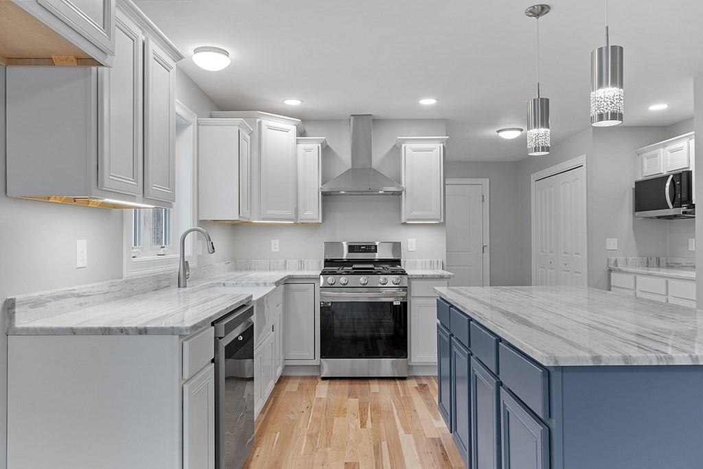 162 French Road Templeton, MA 01468 - Photo 16 of 40 a kitchen with stainless steel appliances granite countertop a sink stove and refrigerator