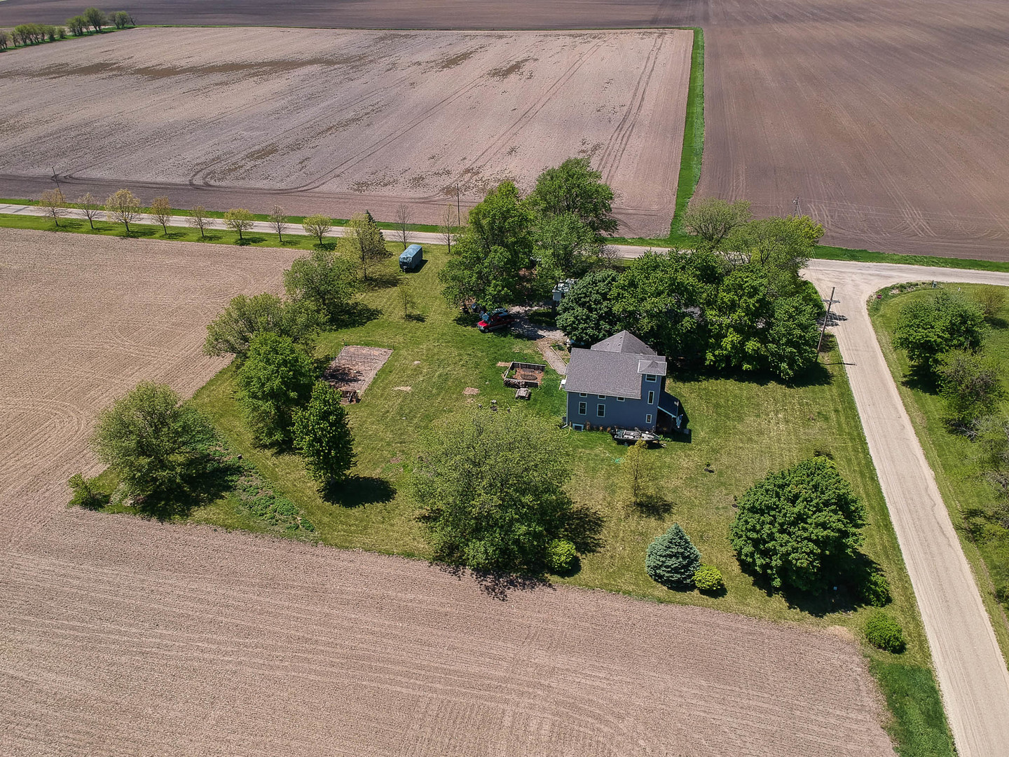 12014 Prairie Center Road Clinton, IL 61727 - Photo 51 of 56 an aerial view of a house with a garden