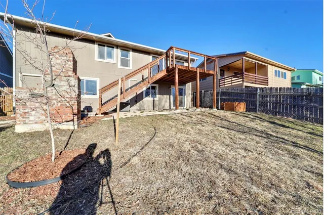 a view of a house with a street