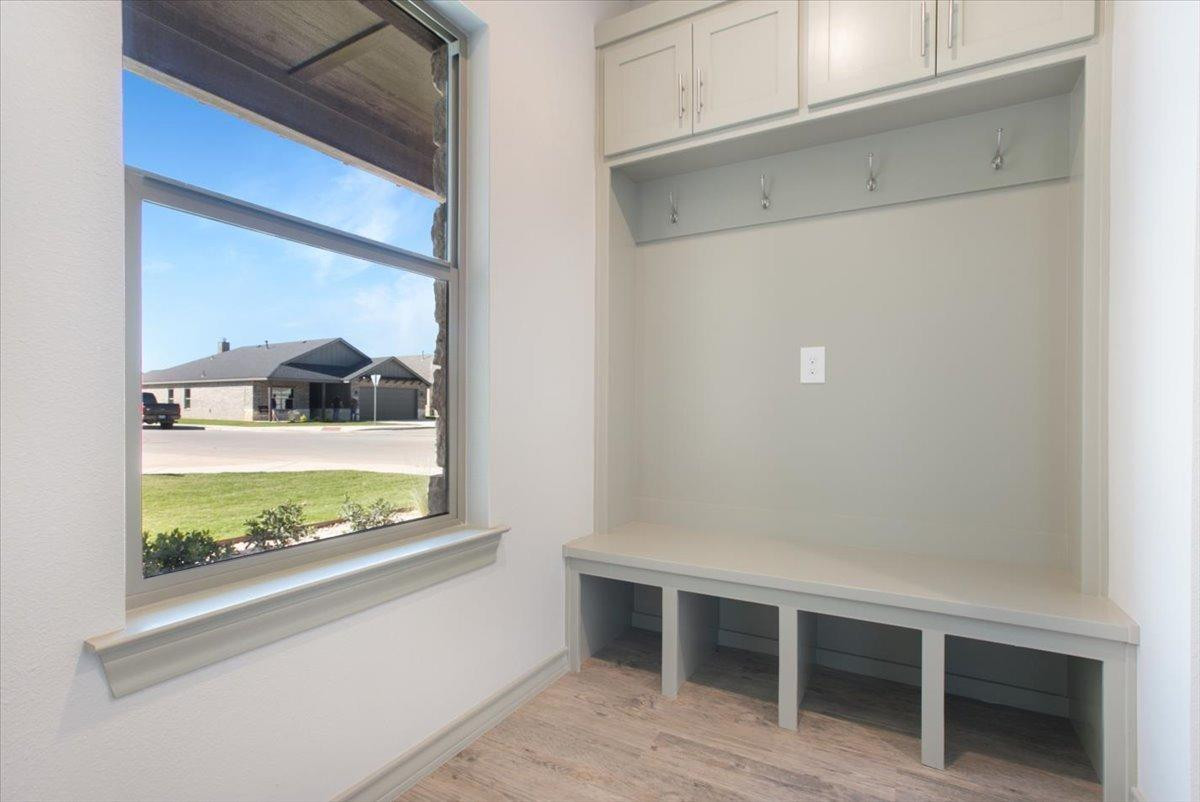 5846 Harvard Street Lubbock, TX 79416 - Photo 19 of 24 a view of an empty room with a window