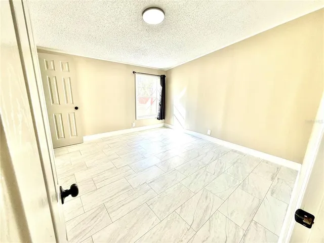 a view of a big room with wooden floor