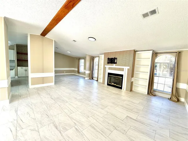 a view of a livingroom with a fireplace