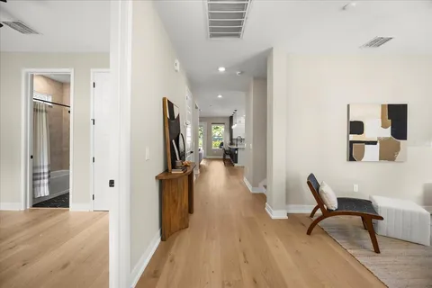 a view of a living room and dining room