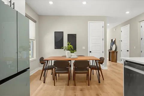 a view of a dining room with furniture