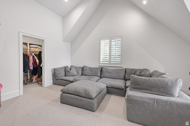 180 Farm Road Midway, UT 84049 - Photo 72 of 99 Sloped ceiling design, recessed lighting, plantation shutters, built-in closet organization, and light-toned carpeting