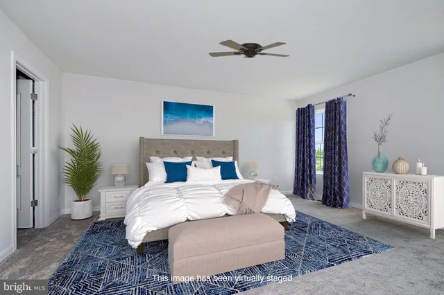 a bed room with a bed and a couch