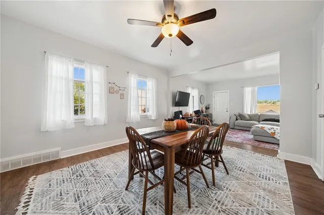 a view of a dining room with furniture