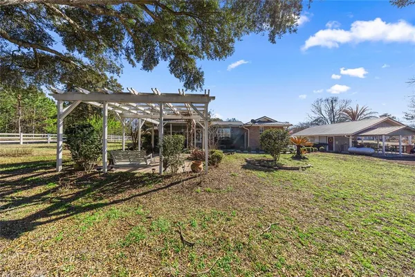 a patio with table and chairs