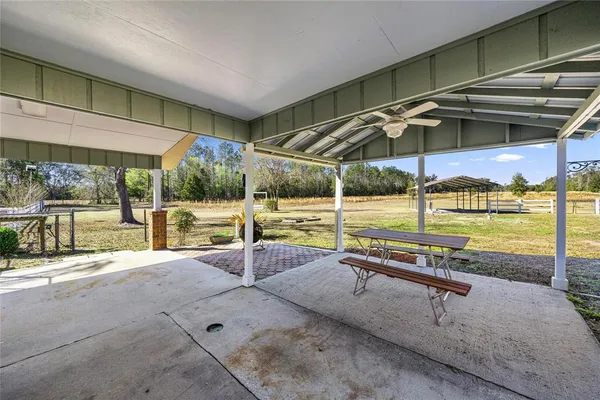 a room with a table and chairs