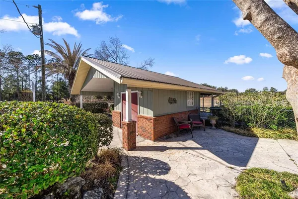 a view of a swimming pool with a lounge chairs