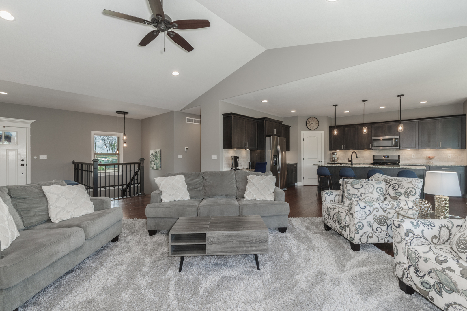 15924 Belfry Drive Bloomington, IL 61705 - Photo 18 of 59 a living room with furniture and kitchen view