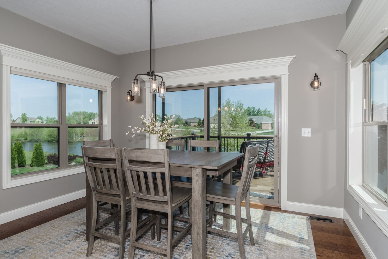 15924 Belfry Drive Bloomington, IL 61705 - Photo 25 of 59 a dining room with furniture window wooden floor