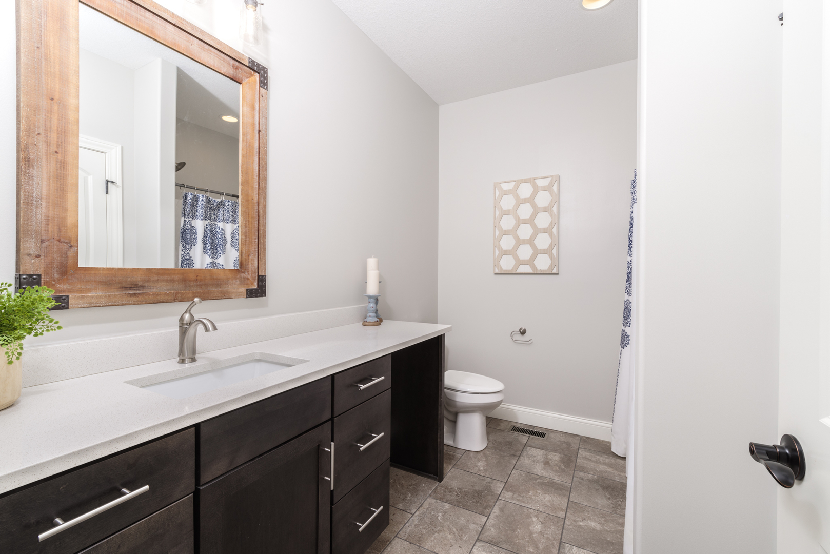 15924 Belfry Drive Bloomington, IL 61705 - Photo 30 of 59 a bathroom with a sink and a mirror