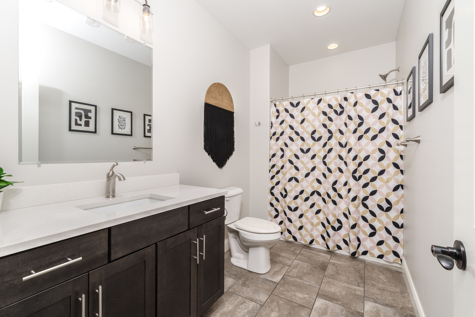 15924 Belfry Drive Bloomington, IL 61705 - Photo 36 of 59 a bathroom with a granite countertop sink a toilet and a mirror