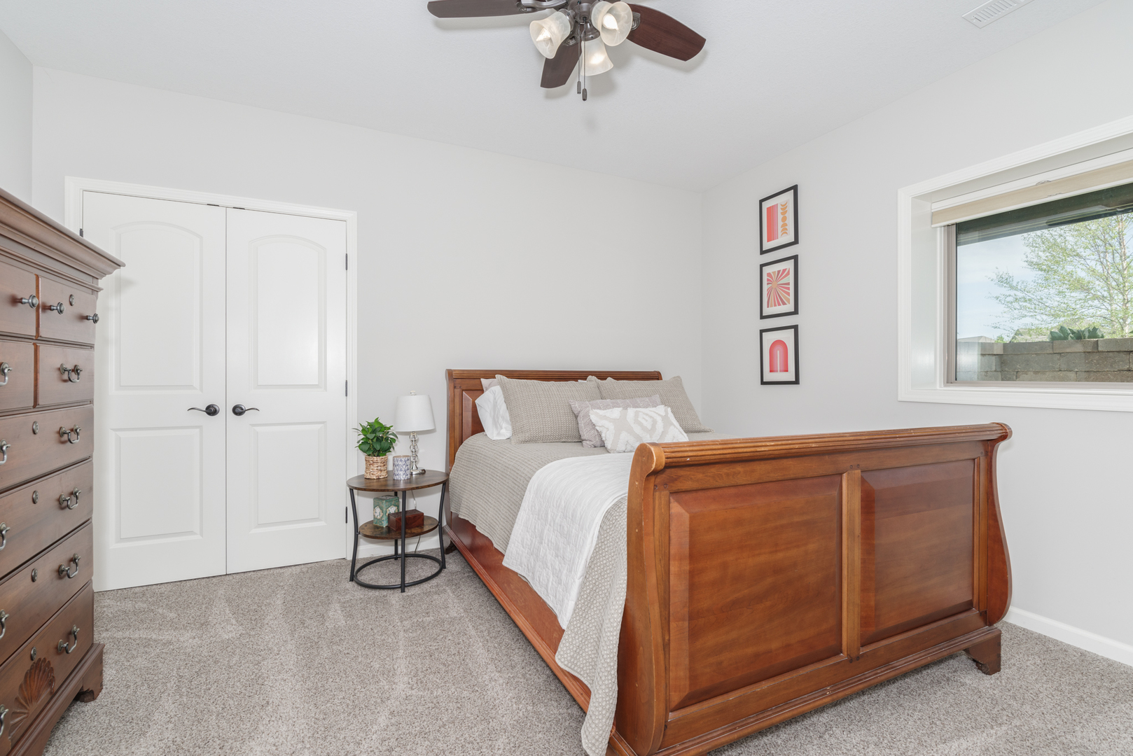 15924 Belfry Drive Bloomington, IL 61705 - Photo 41 of 59 a spacious bedroom with a bed and a dresser