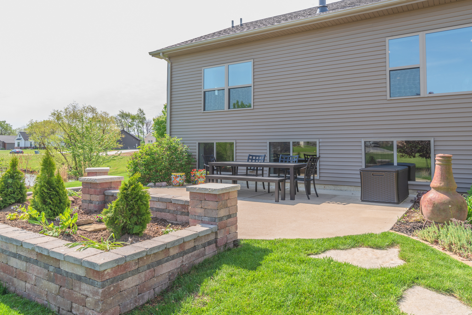 15924 Belfry Drive Bloomington, IL 61705 - Photo 57 of 59 a view of a house with furniture and garden