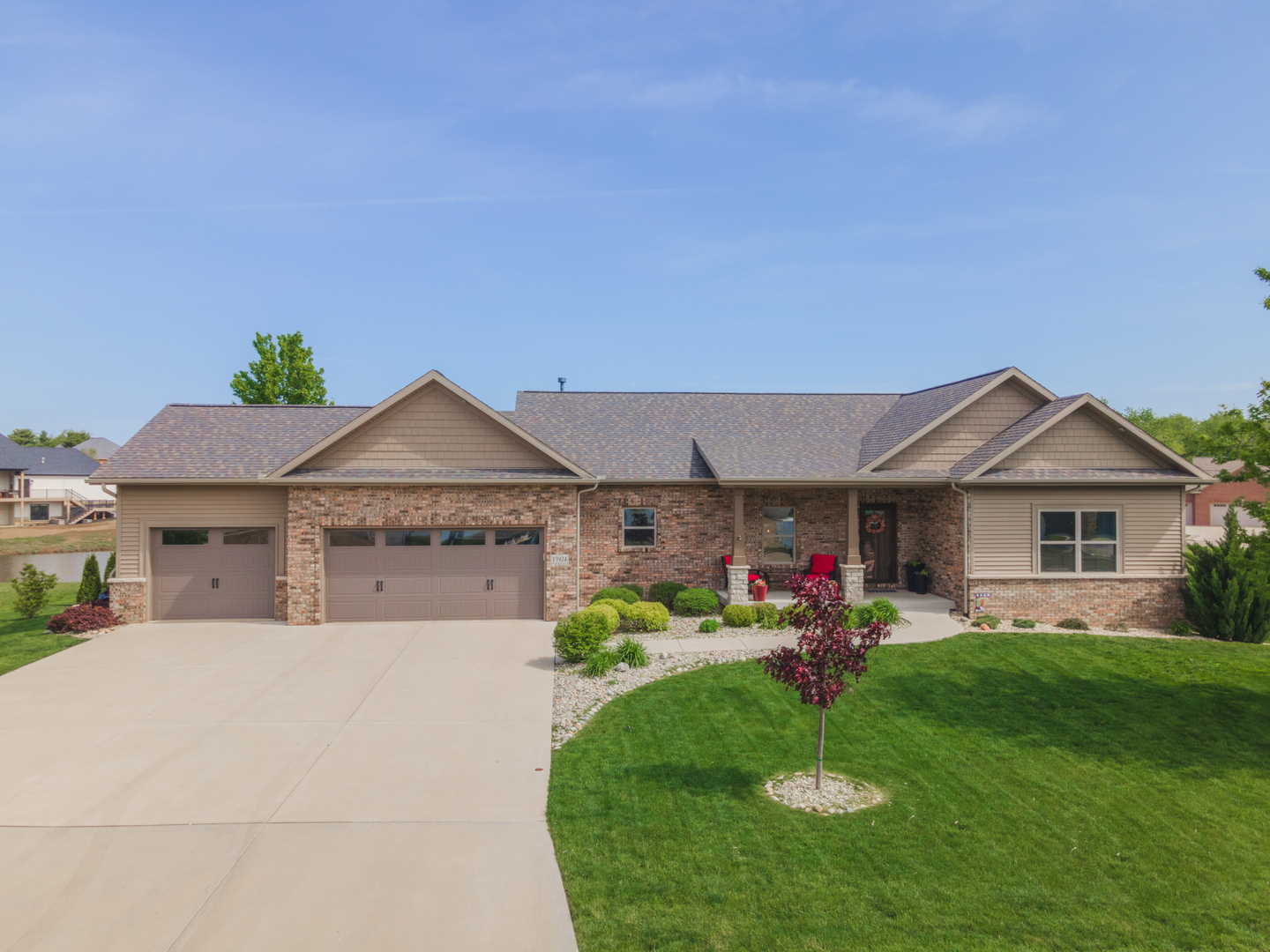 15924 Belfry Drive Bloomington, IL 61705 - Photo 58 of 59 a view of a house with a backyard